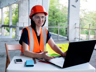 Woman using a construction project management software
